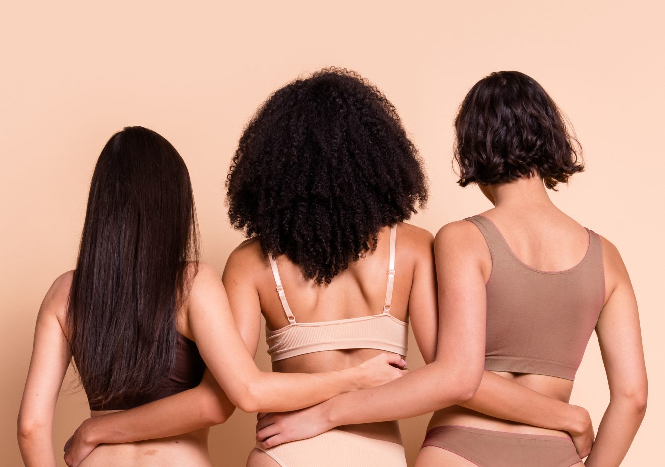 Women with diverse skin tones modelling underwear