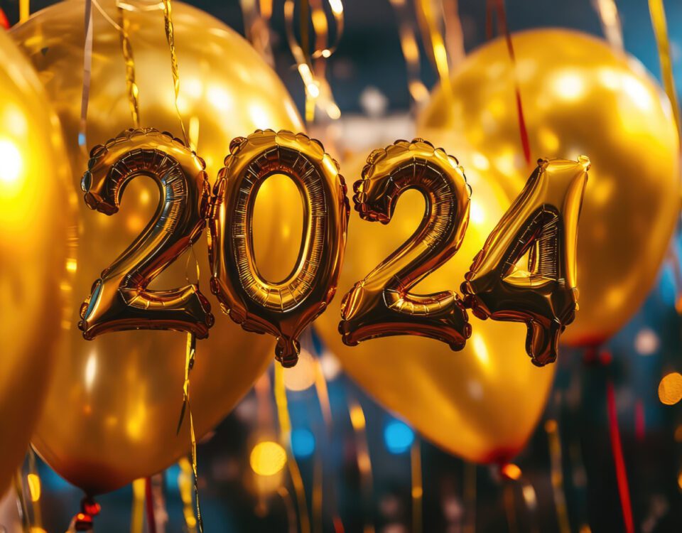 Golden celebration balloons in the shape of 2024 numbers