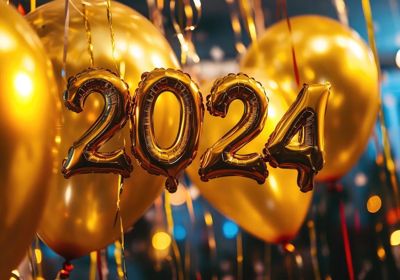 Golden celebration balloons in the shape of 2024 numbers